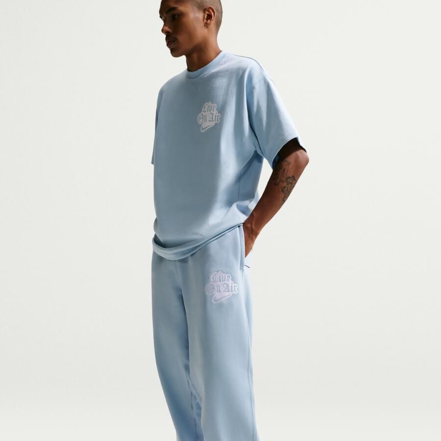Nike Solo Swoosh fleecebroek met boorden voor heren Blauw - Foto 3