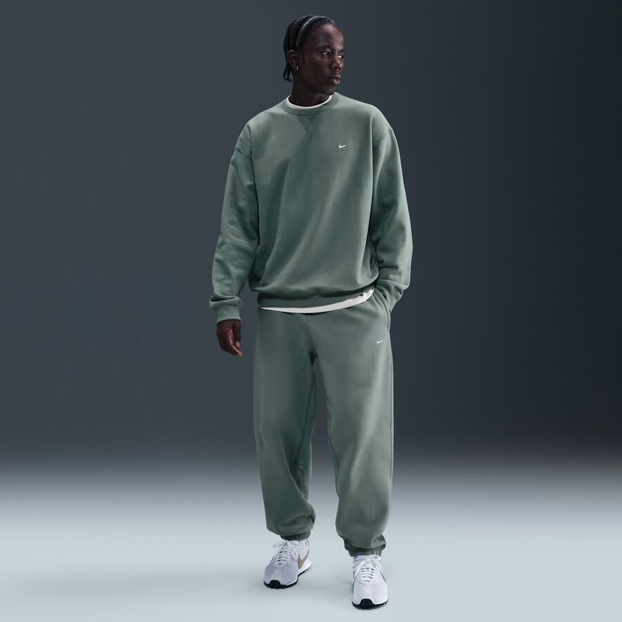 Nike Solo Swoosh fleecebroek met boorden voor heren Grijs - Foto 4