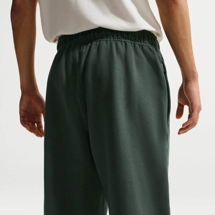 Nike Solo Swoosh fleecebroek met open zoom voor heren Groen