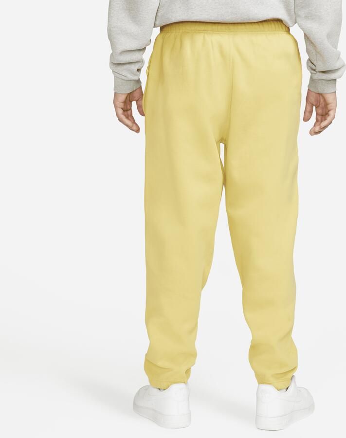 Nike Solo Swoosh Fleecebroek voor heren Geel - Foto 3