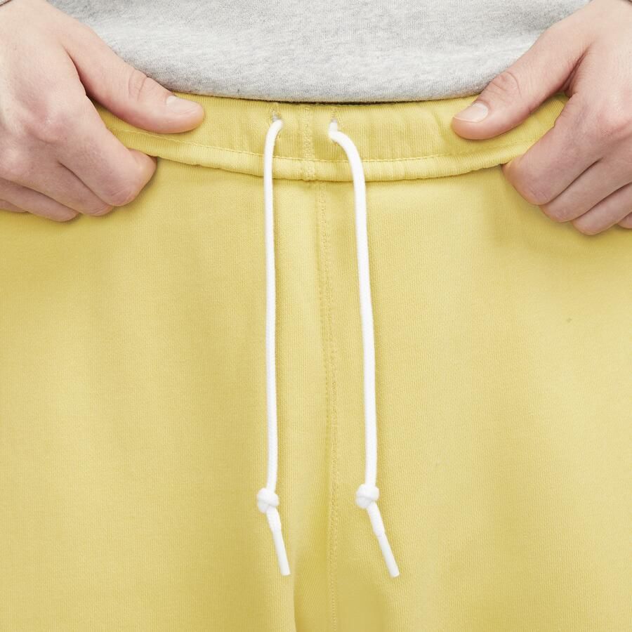 Nike Solo Swoosh Fleecebroek voor heren Geel - Foto 2