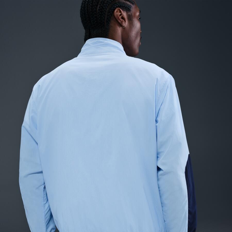 Nike Sportswear geweven trainingsjack voor heren Blauw