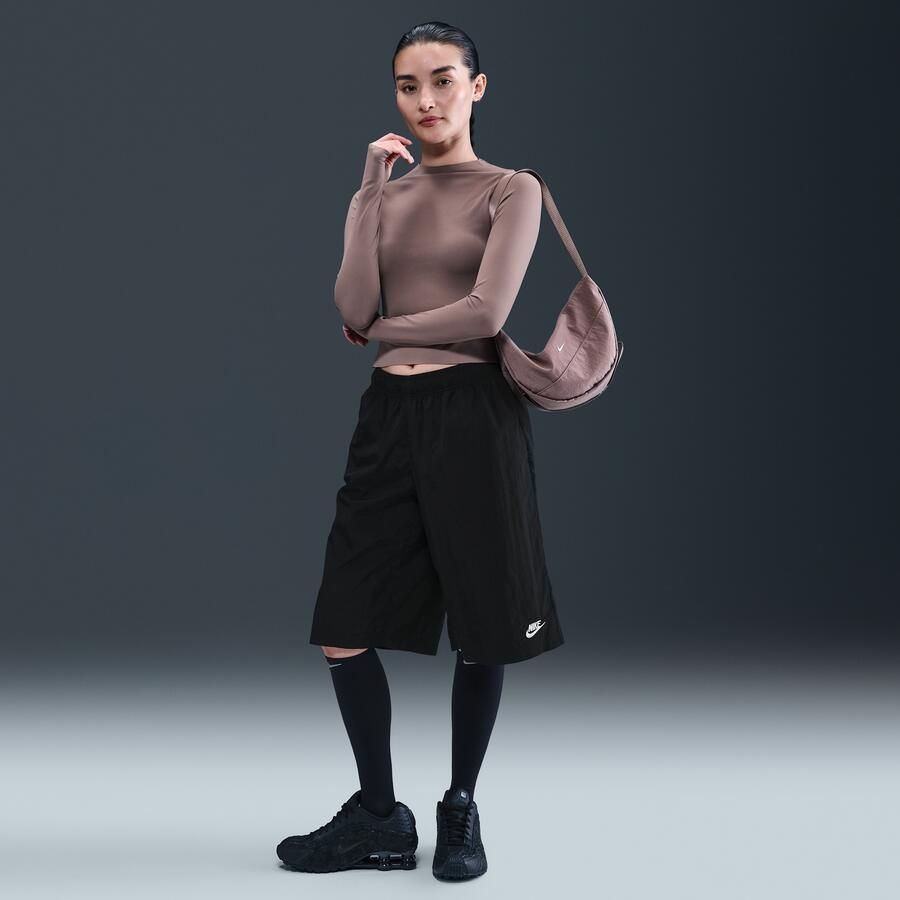 Nike ruimvallende damesshorts met halfhoge taille op knielengte Zwart - Foto 3