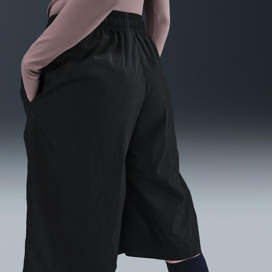 Nike ruimvallende damesshorts met halfhoge taille op knielengte Zwart - Foto 2