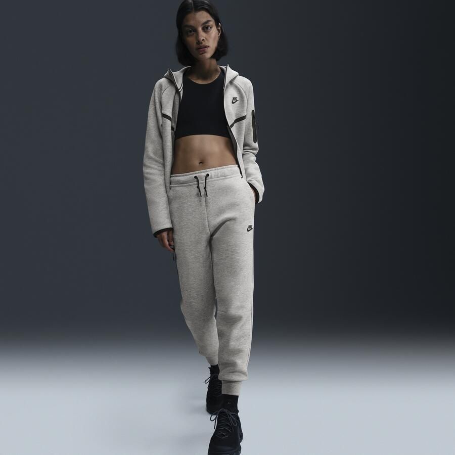 Nike Tech Fleece joggingbroek met halfhoge taille voor dames Grijs