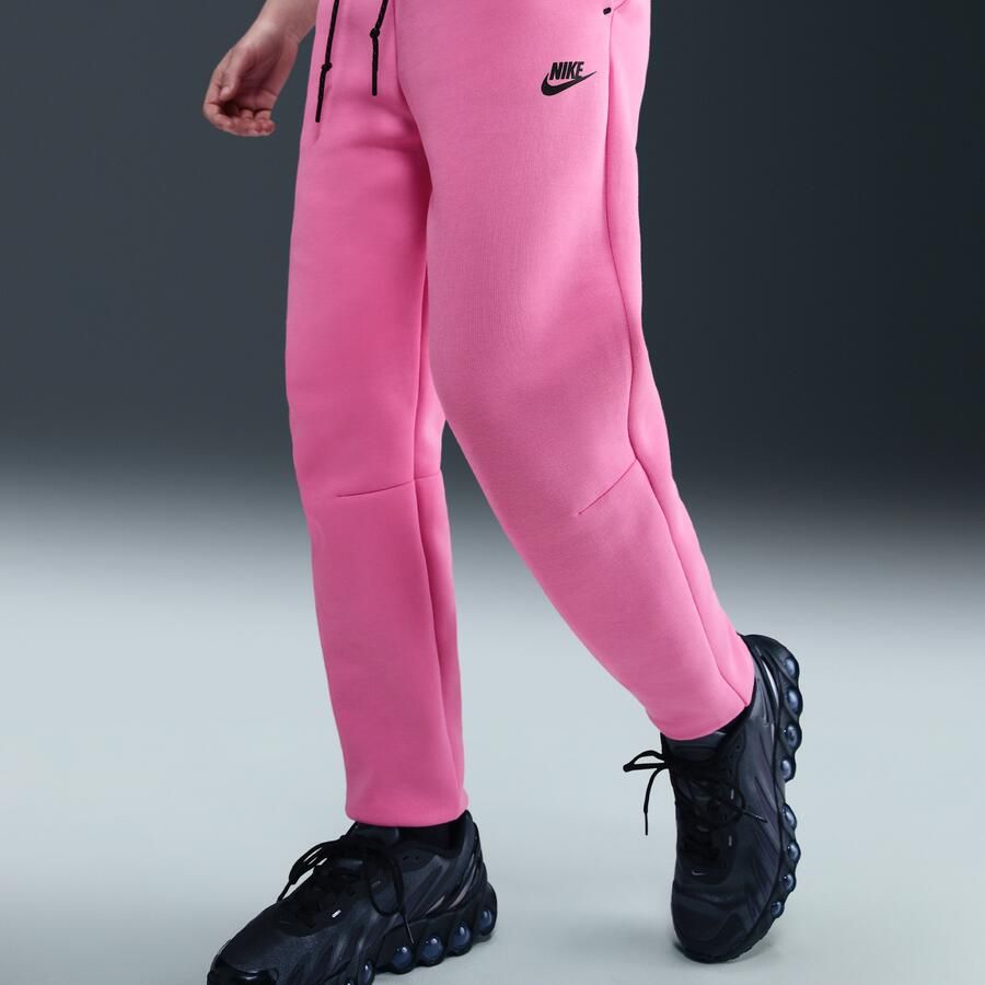 Nike Tech Fleece joggingbroek met halfhoge taille voor dames Roze