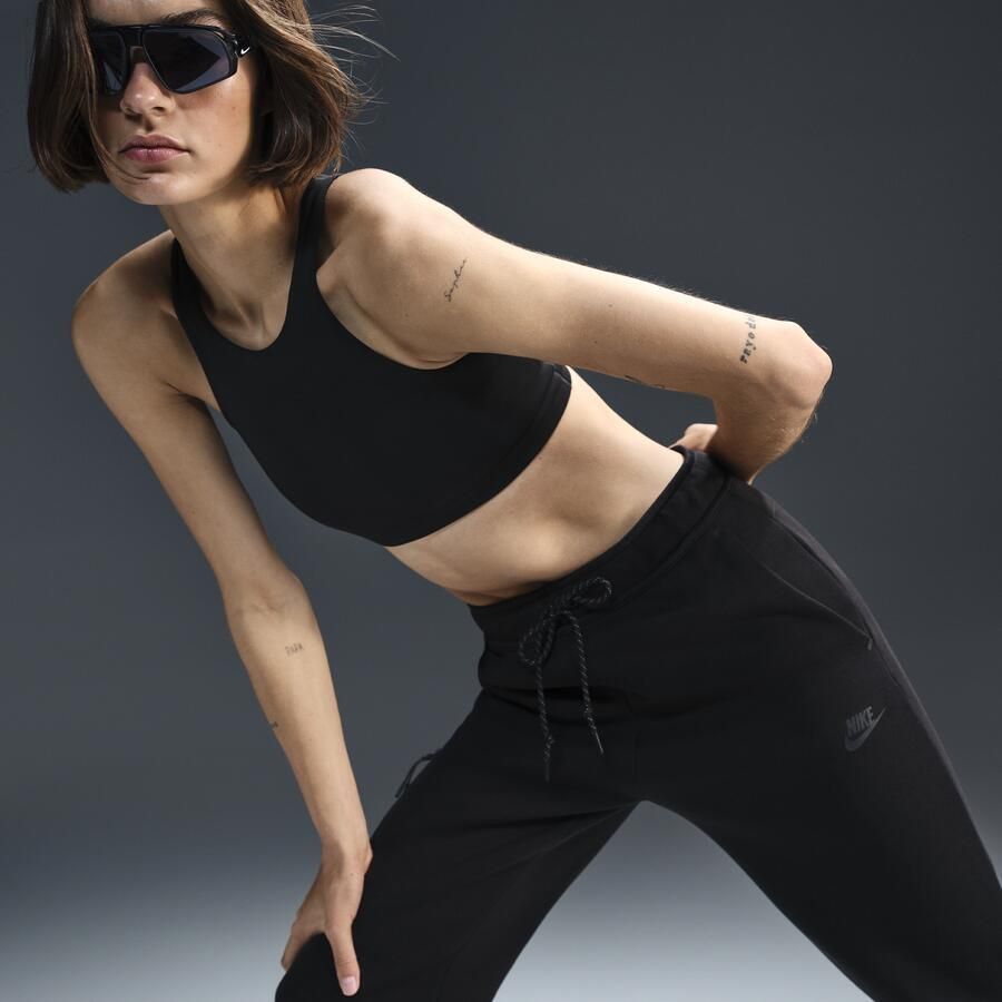 Nike Tech Fleece joggingbroek met halfhoge taille voor dames Zwart - Foto 4