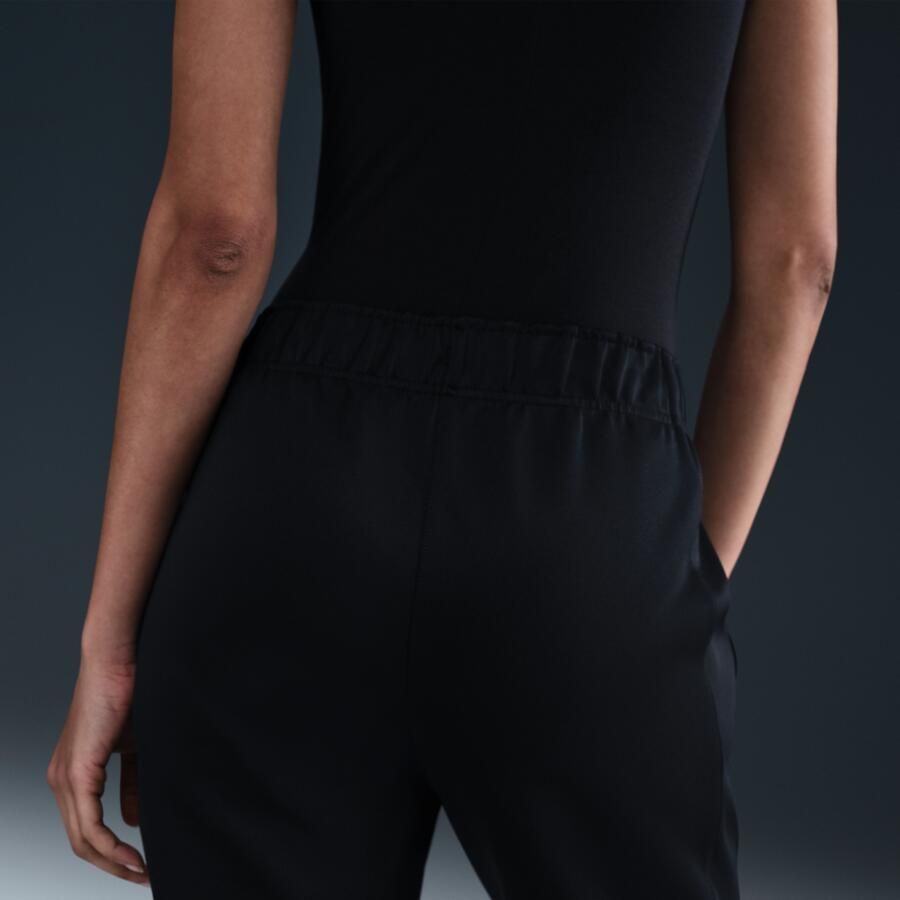 Nike Windrunner aansluitende knit damesbroek met halfhoge taille Zwart