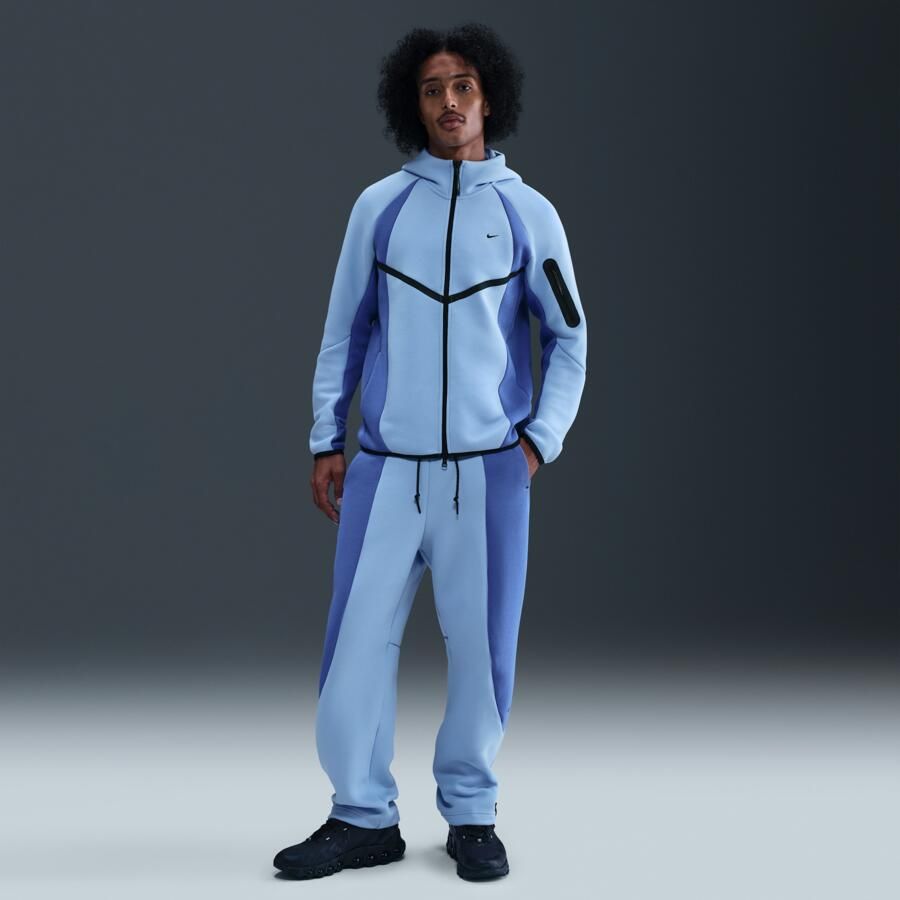 Nike Tech fleecebroek met kleurblokken en open zoom voor heren Blauw - Foto 4