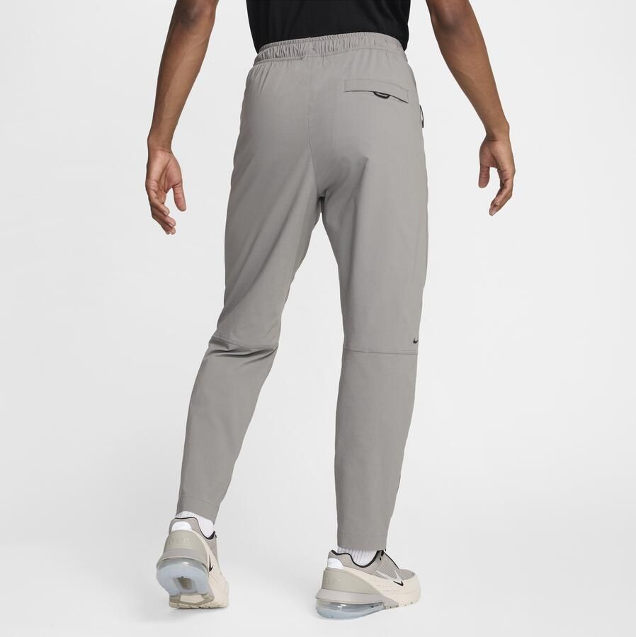 Nike Tech geweven herenbroek Grijs - Foto 4