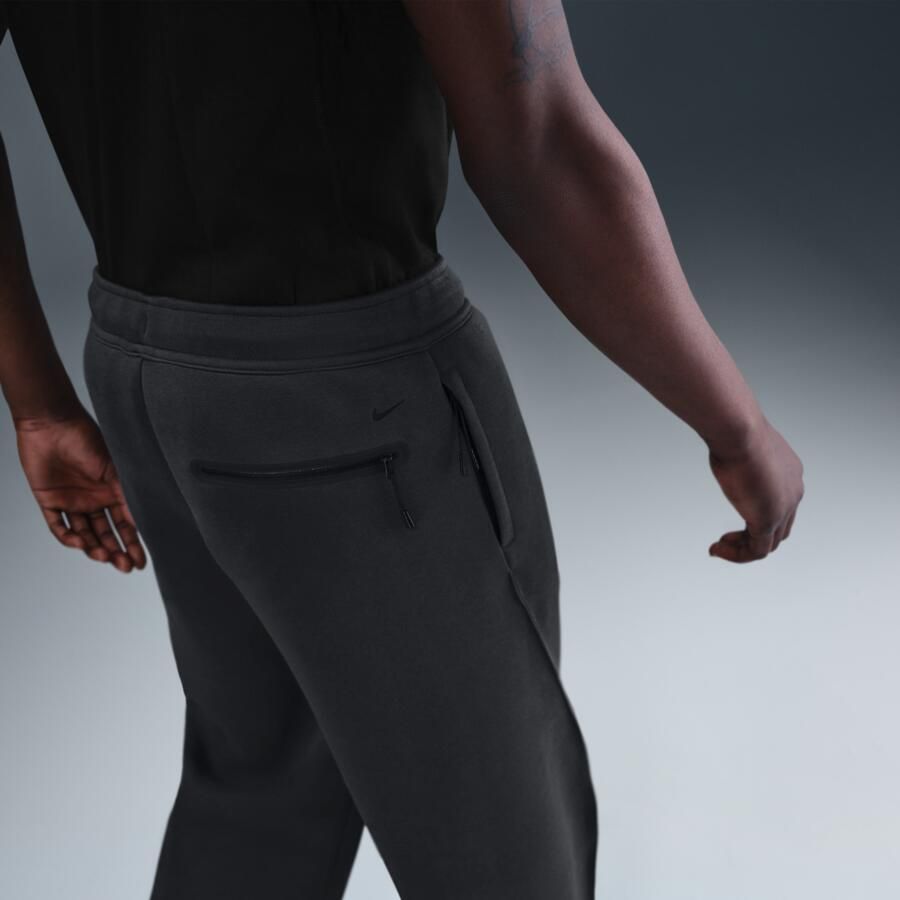 Nike Tech ruimvallende fleecebroek met open zoom voor heren Grijs - Foto 2