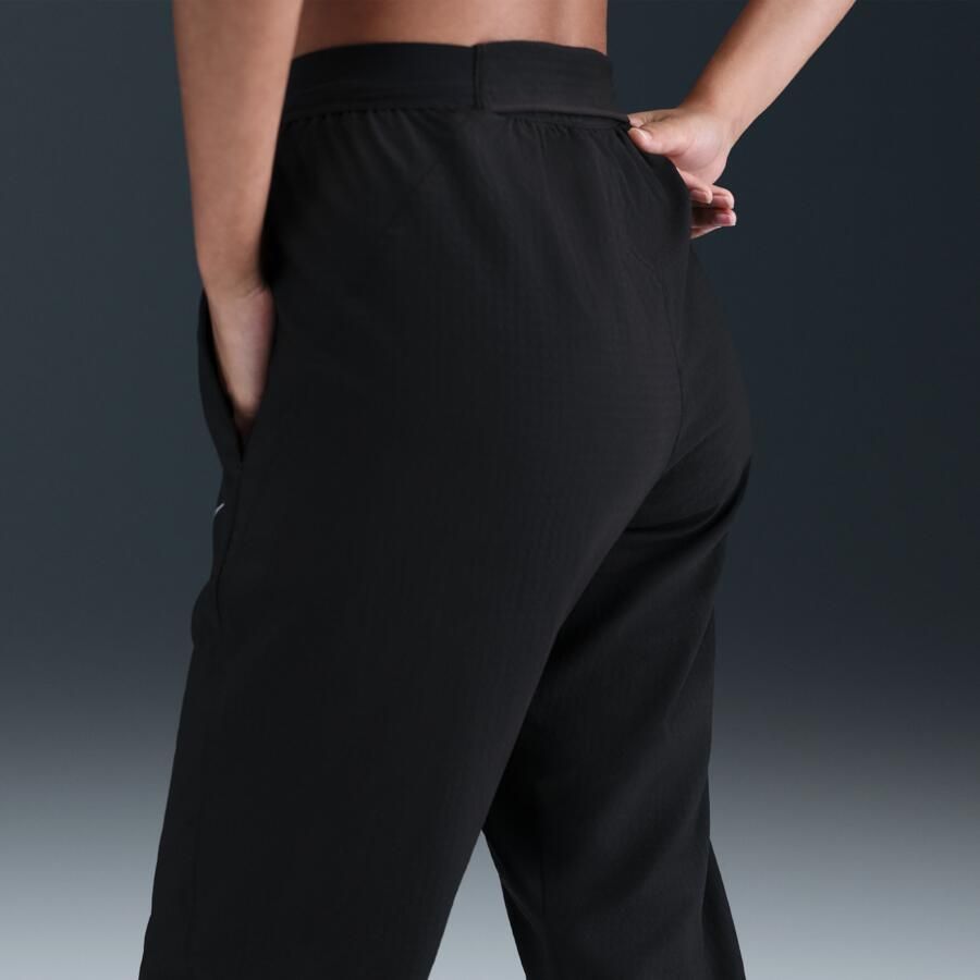 Nike Tempo Warm Dri-FIT hardloopbroek met halfhoge taille voor dames Zwart - Foto 2