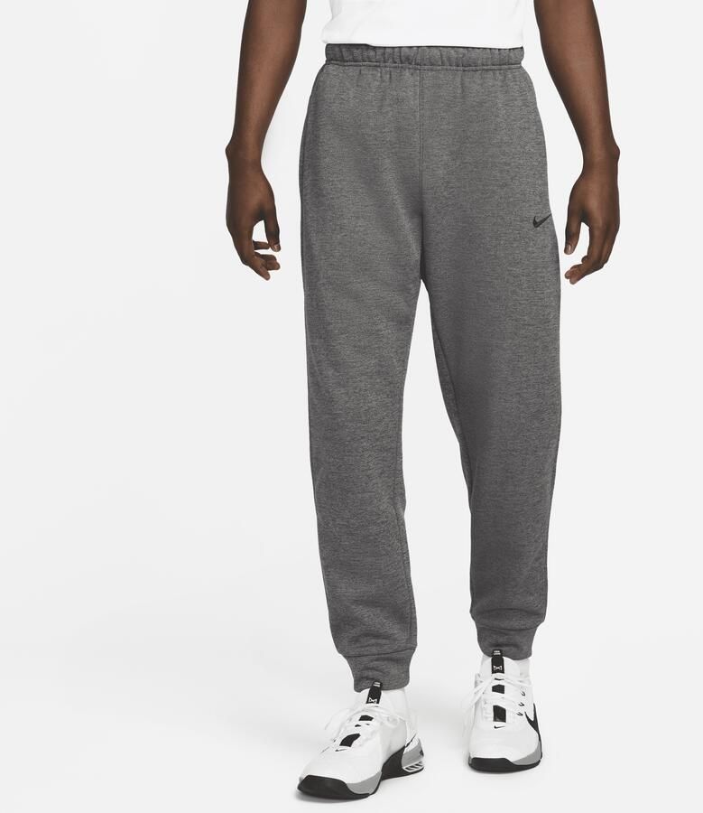 Nike Therma-FIT toelopende fitnessbroek voor heren Grijs - Foto 3