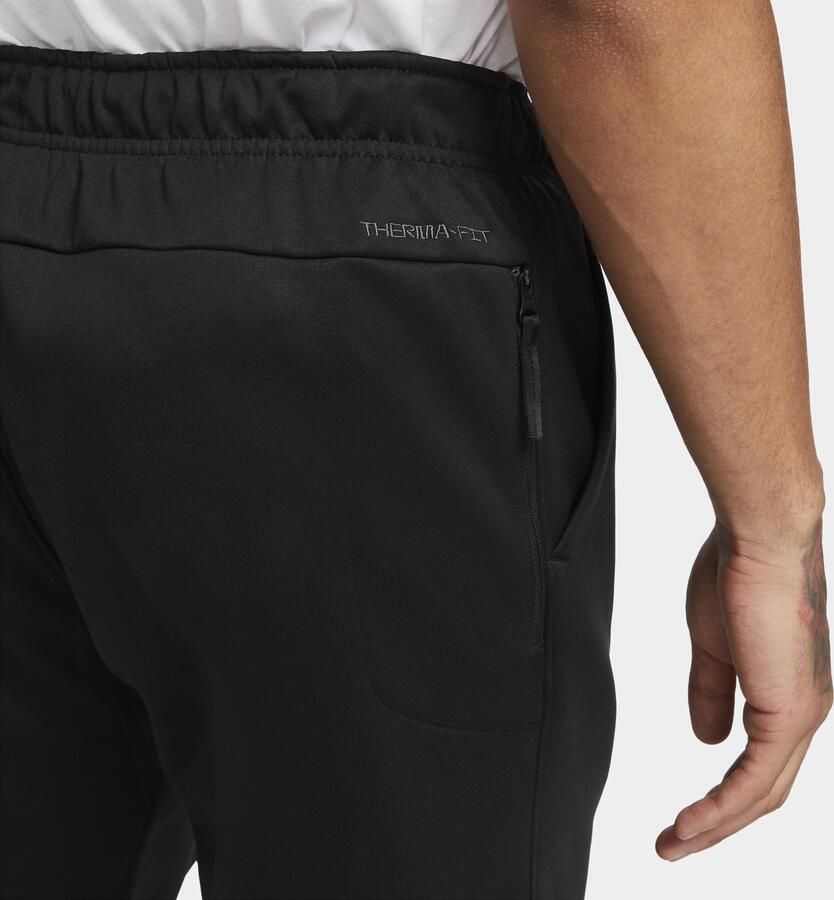 Nike Therma-FIT toelopende fitnessbroek voor heren Zwart - Foto 3