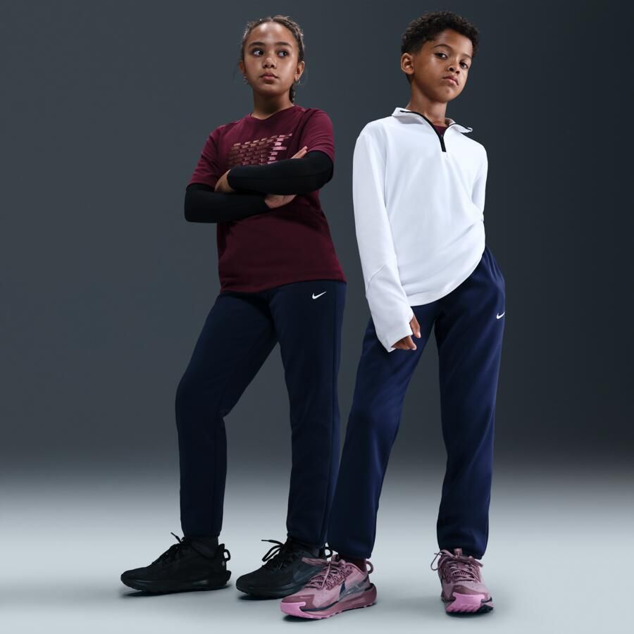 Nike Therma-FIT winterse trainingsbroek voor kids Blauw - Foto 4