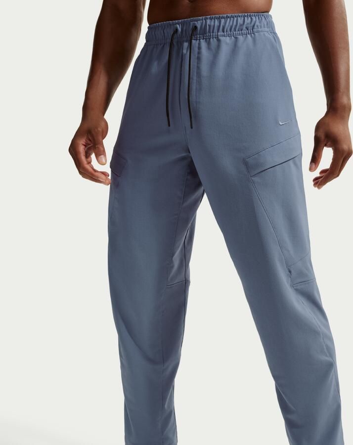 Nike Unlimited Dri-FIT veelzijdige cargobroek voor heren Blauw