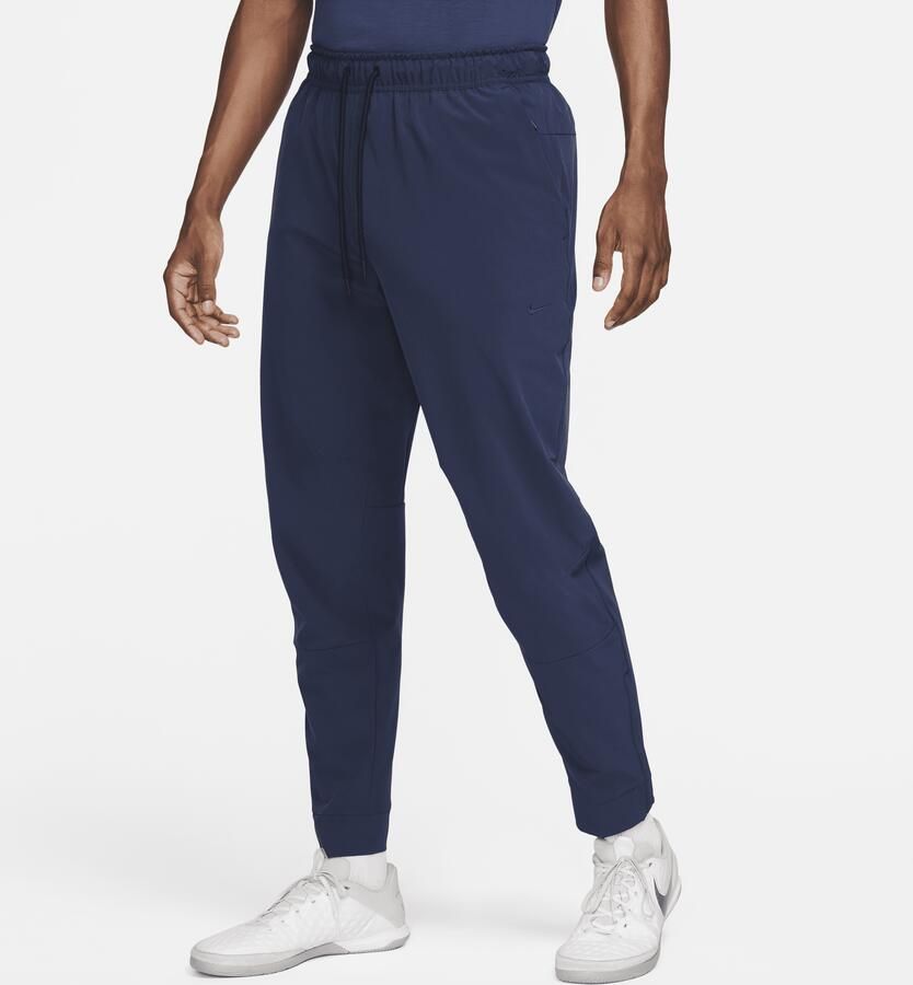 Nike Unlimited Dri-FIT veelzijdige herenbroek met ritsboord Blauw - Foto 2