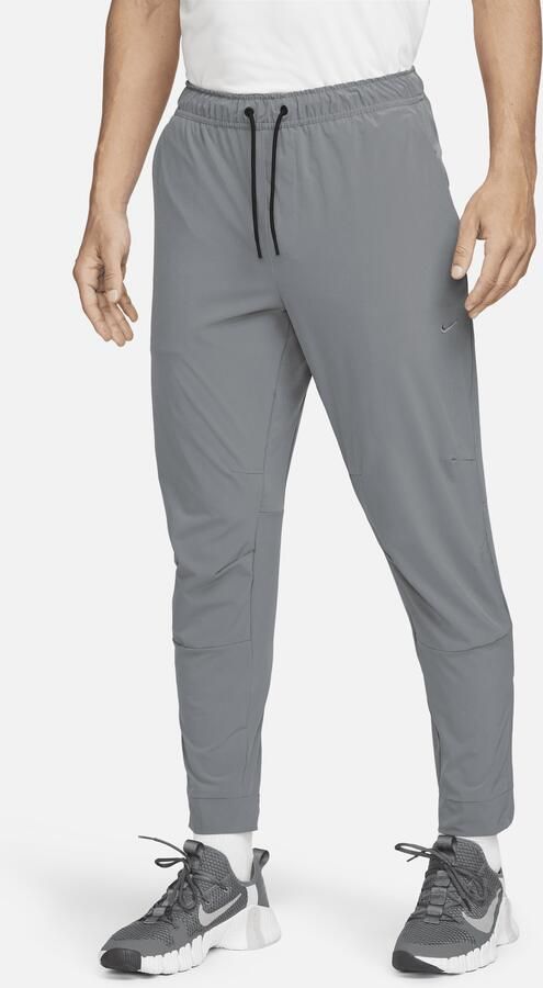 Nike Unlimited Dri-FIT veelzijdige herenbroek met ritsboord Grijs - Foto 3