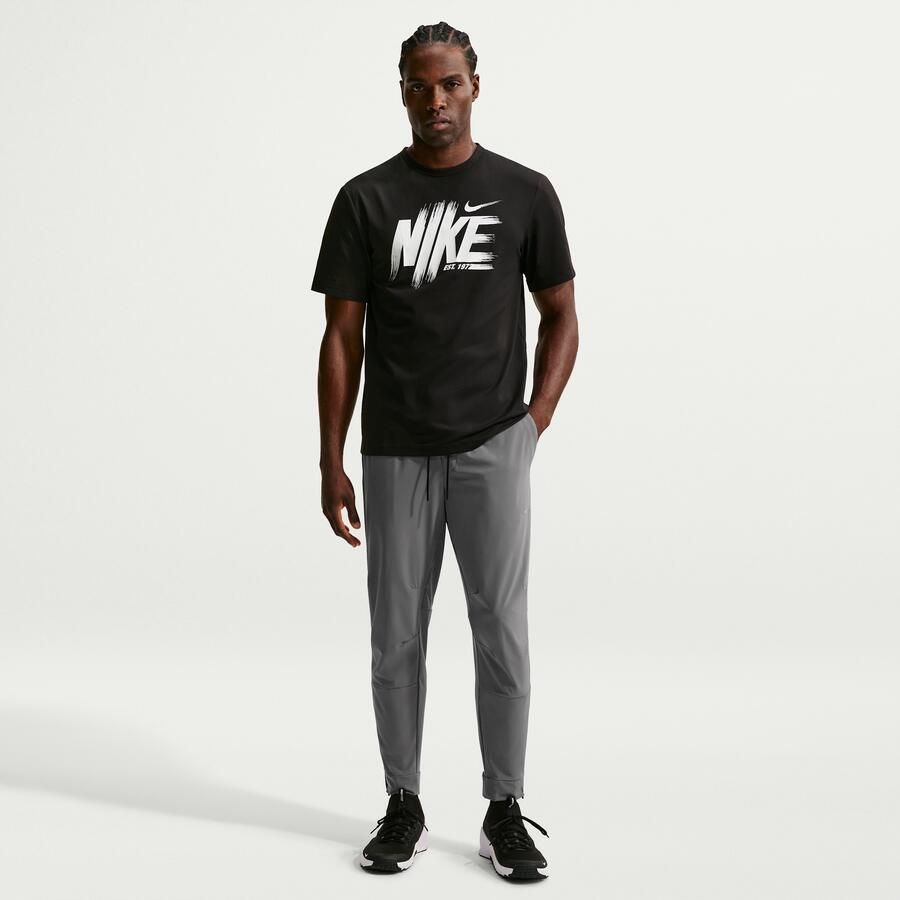 Nike Unlimited Dri-FIT veelzijdige herenbroek met ritsboord Grijs