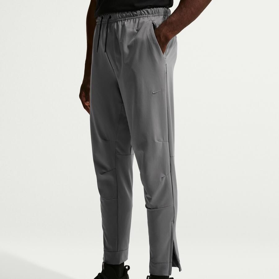 Nike Unlimited Dri-FIT veelzijdige herenbroek met ritsboord Grijs - Foto 2