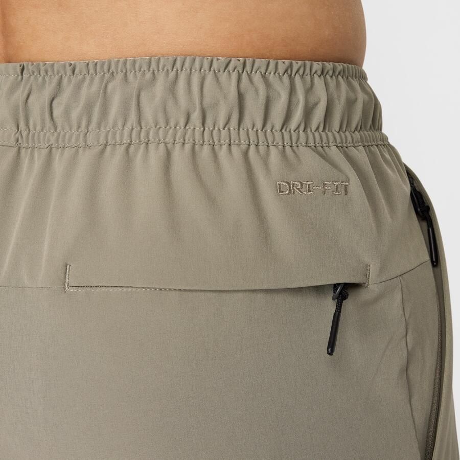 Nike Unlimited Dri-FIT veelzijdige herenbroek met ritsboord Groen - Foto 3