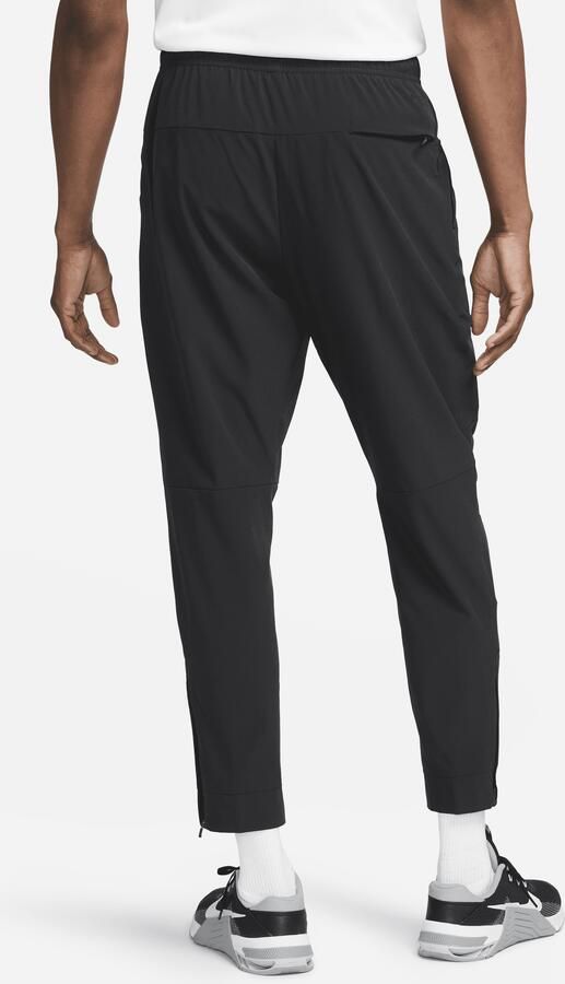 Nike Unlimited Dri-FIT veelzijdige herenbroek met ritsboord Zwart - Foto 4