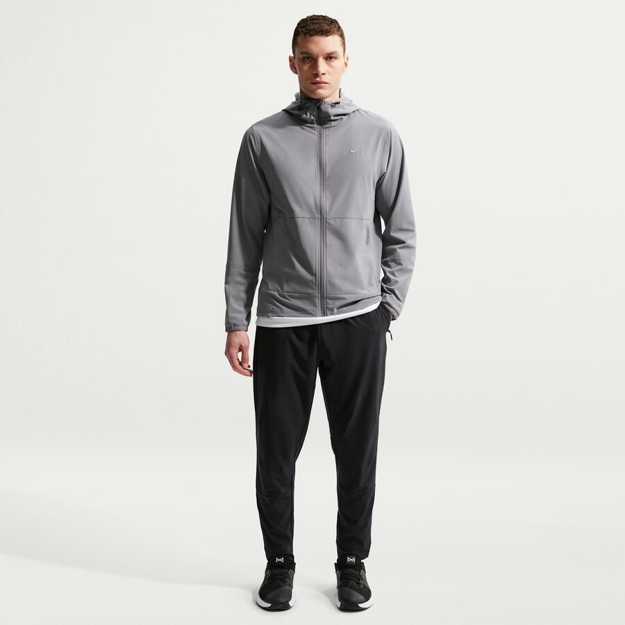 Nike Unlimited Dri-FIT veelzijdige herenbroek met ritsboord Zwart