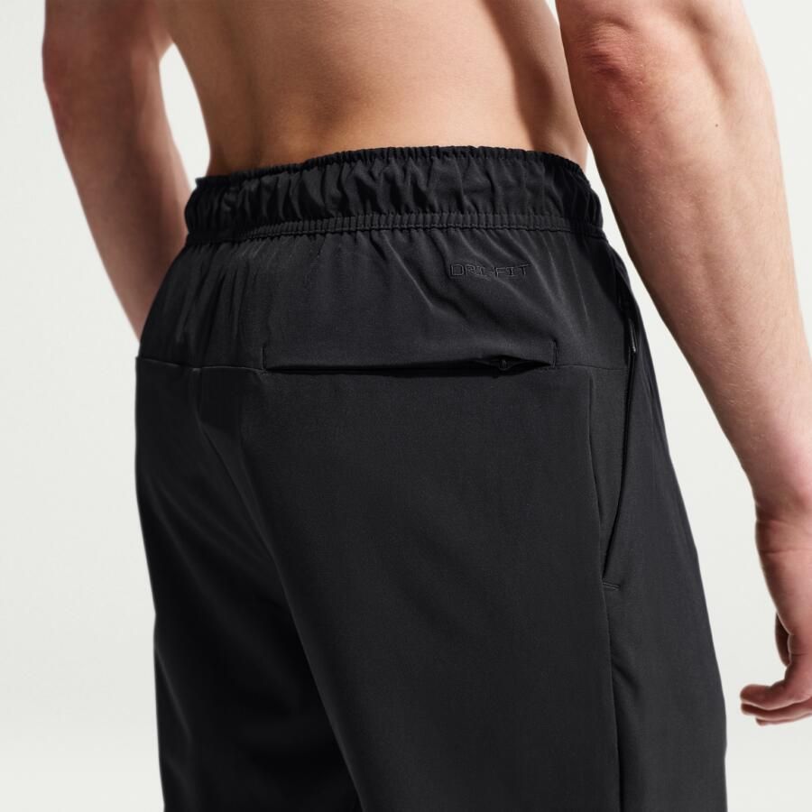 Nike Unlimited Dri-FIT veelzijdige herenbroek met ritsboord Zwart - Foto 3