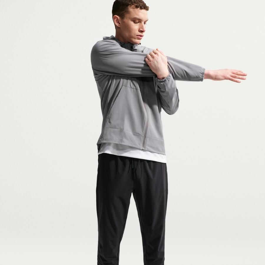 Nike Unlimited Dri-FIT veelzijdige herenbroek met ritsboord Zwart - Foto 4