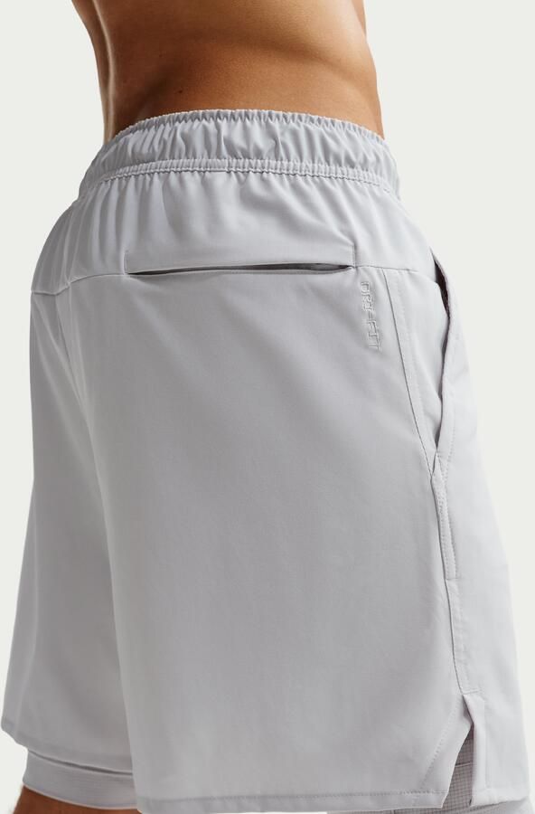Nike Unlimited multifunctionele 2-in-1 herenshorts met Dri-FIT (18 cm) Grijs