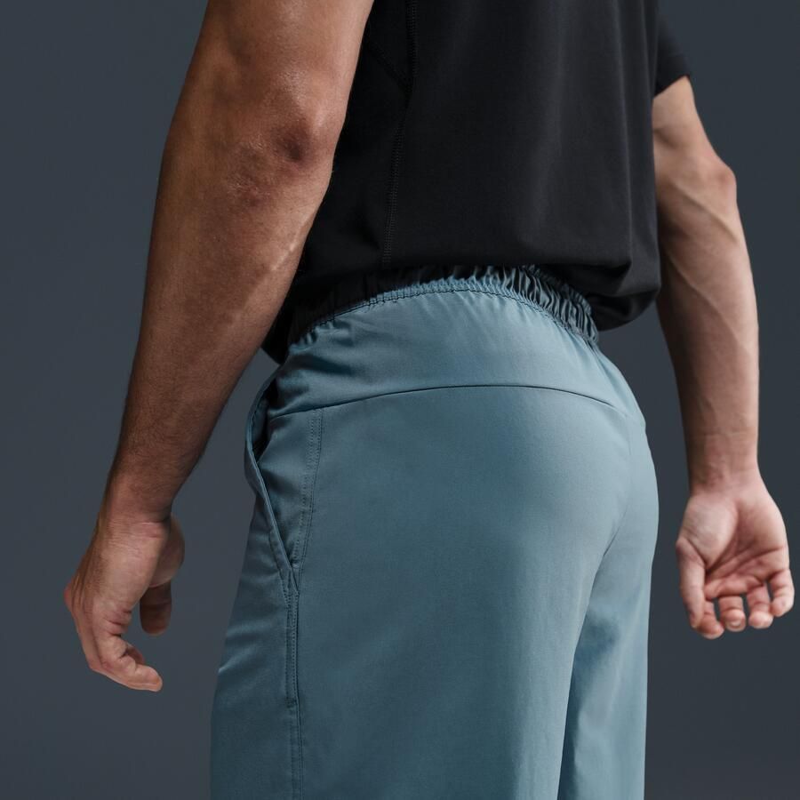 Nike Unlimited multifunctionele niet-gevoerde herenshorts met Dri-FIT (18 cm) Blauw - Foto 2