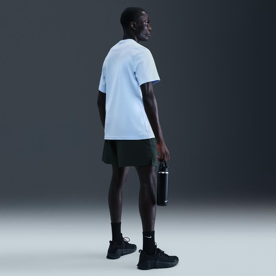 Nike Unlimited multifunctionele niet-gevoerde herenshorts met Dri-FIT (18 cm) Groen - Foto 3