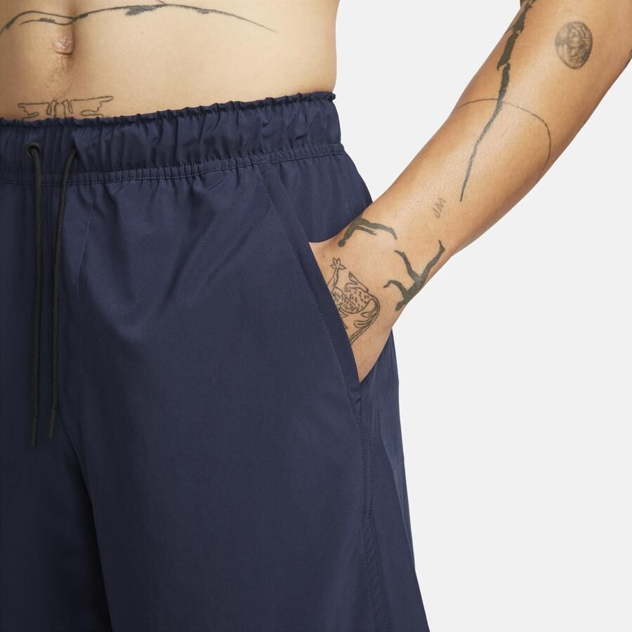 Nike Unlimited multifunctionele niet-gevoerde herenshorts met Dri-FIT (23 cm) Blauw