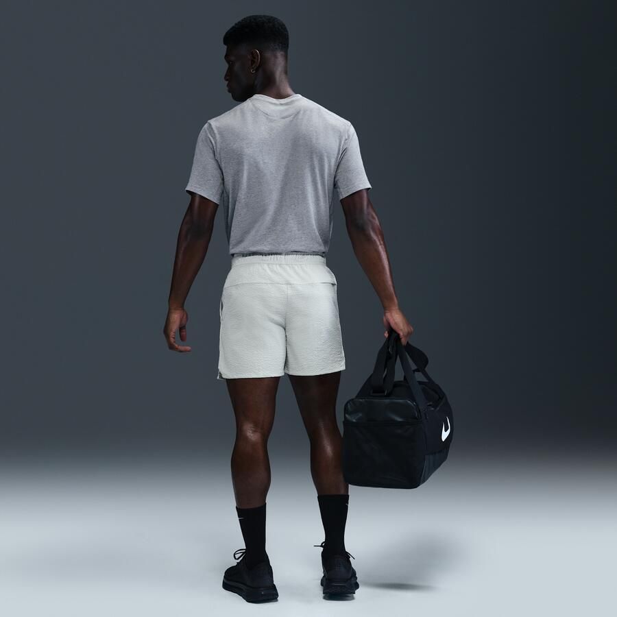 Nike Unlimited multifunctionele niet-gevoerde herenshorts van seersucker met Dri-FIT (13 cm) Grijs - Foto 3