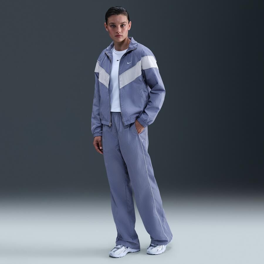 Nike Windrunner geweven damesbroek met hoge taille en open zomen Blauw - Foto 4