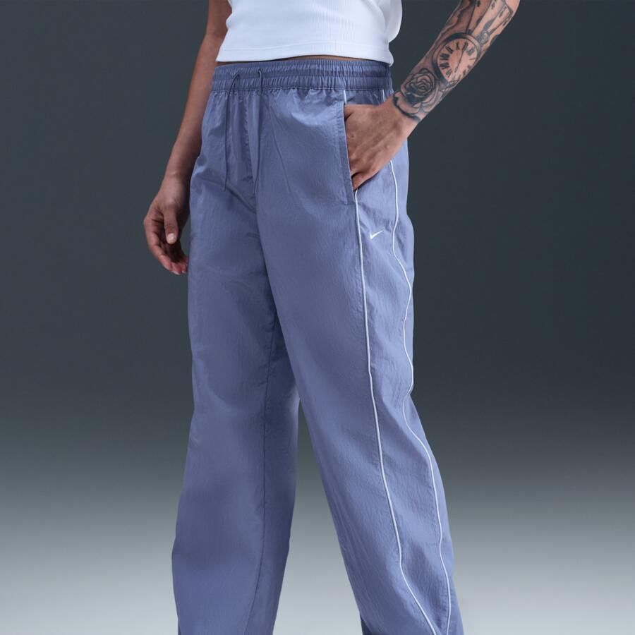 Nike Windrunner geweven damesbroek met hoge taille en open zomen Blauw