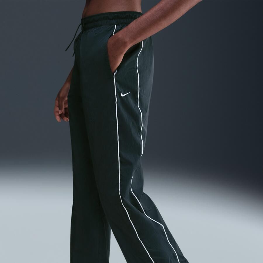 Nike Windrunner geweven damesbroek met hoge taille en open zomen Groen