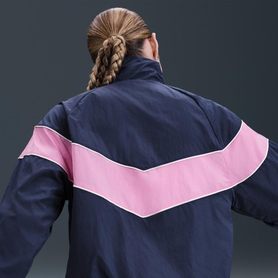 Nike Windrunner ruimvallend geweven damesjack met uv-bescherming en rits over de hele lengte Blauw
