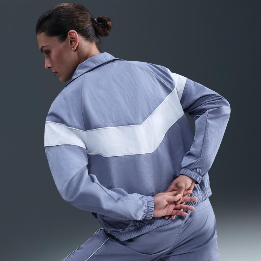 Nike Windrunner ruimvallend geweven damesjack met uv-bescherming en rits over de hele lengte Blauw - Foto 2