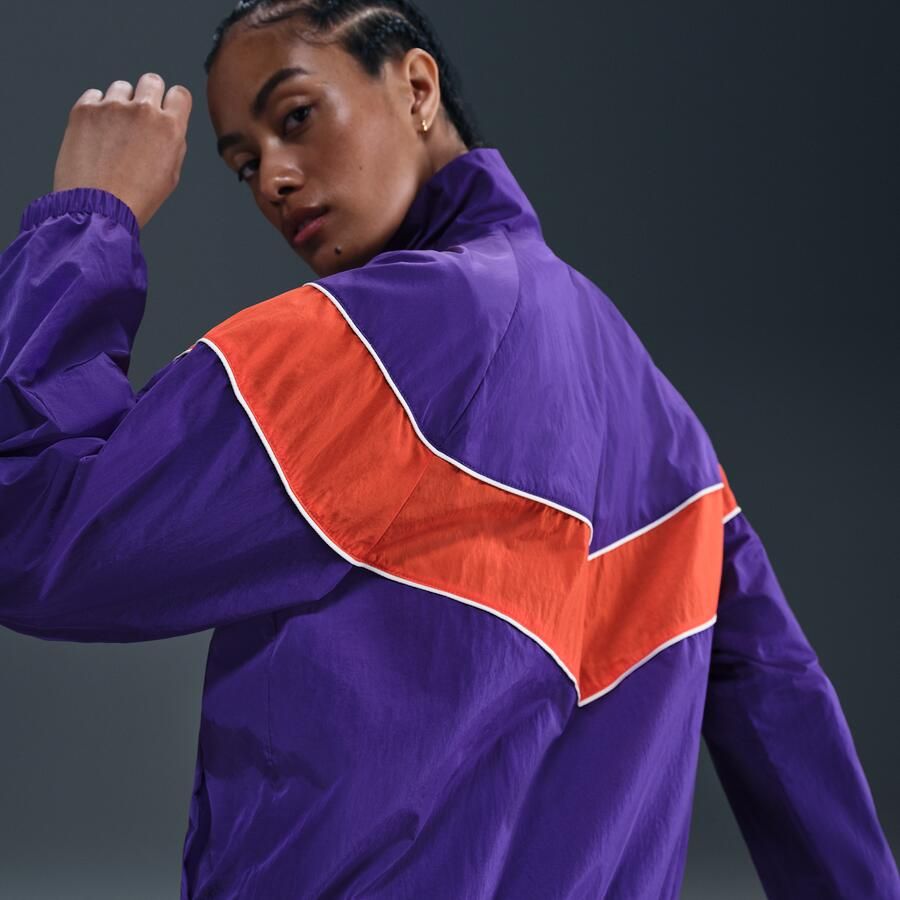 Nike Windrunner ruimvallend geweven damesjack met uv-bescherming en rits over de hele lengte Paars