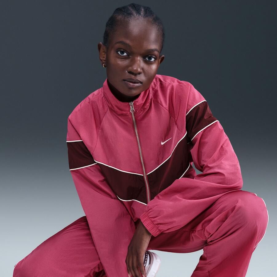 Nike Windrunner ruimvallend geweven damesjack met uv-bescherming en rits over de hele lengte Paars - Foto 2