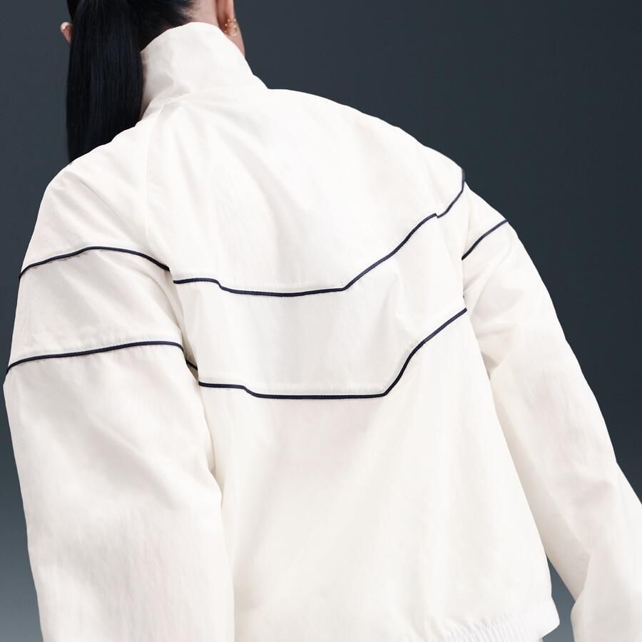 Nike Windrunner ruimvallend geweven damesjack met uv-bescherming en rits over de hele lengte Wit