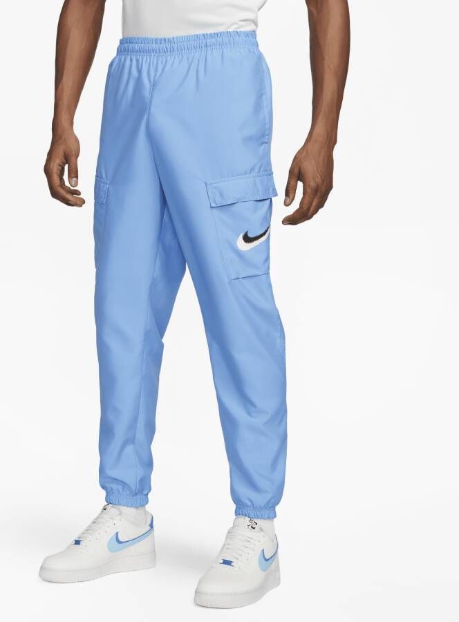 Nike Sportswear Geweven cargobroek voor heren Blauw