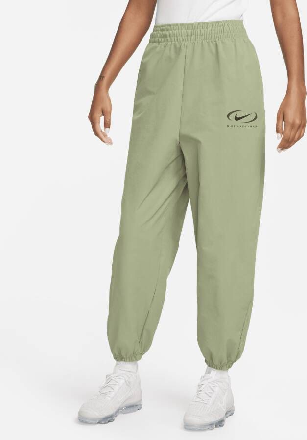 Nike Sportswear geweven joggingbroek voor dames Groen