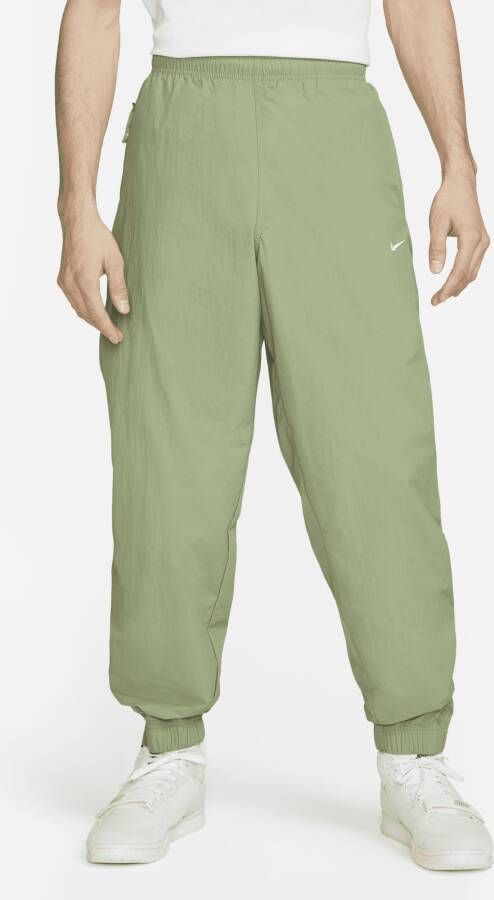 Nike Sportswear Solo Swoosh Trainingsbroek voor heren Groen