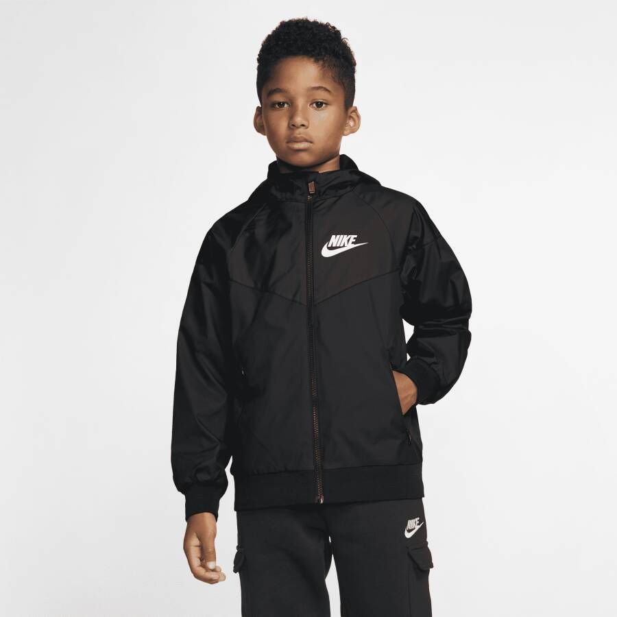 Nike Sportswear Windrunner ruimvallend jongensjack op heuplengte met capuchon Zwart