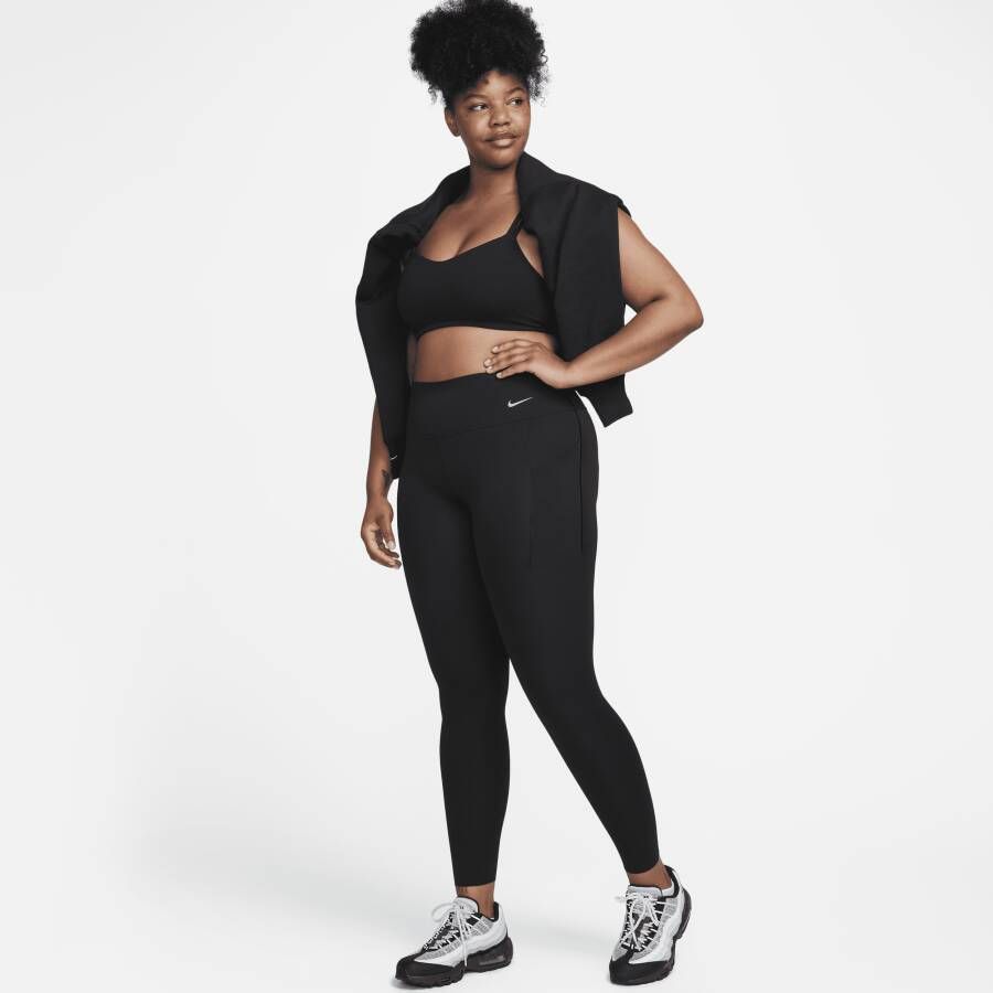 Nike Universa Legging met halfhoge taille en medium ondersteuning en zakken voor dames Zwart