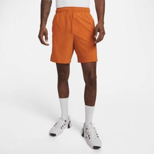 Nike Unlimited multifunctionele niet-gevoerde herenshorts met Dri-FIT (18 cm) Oranje