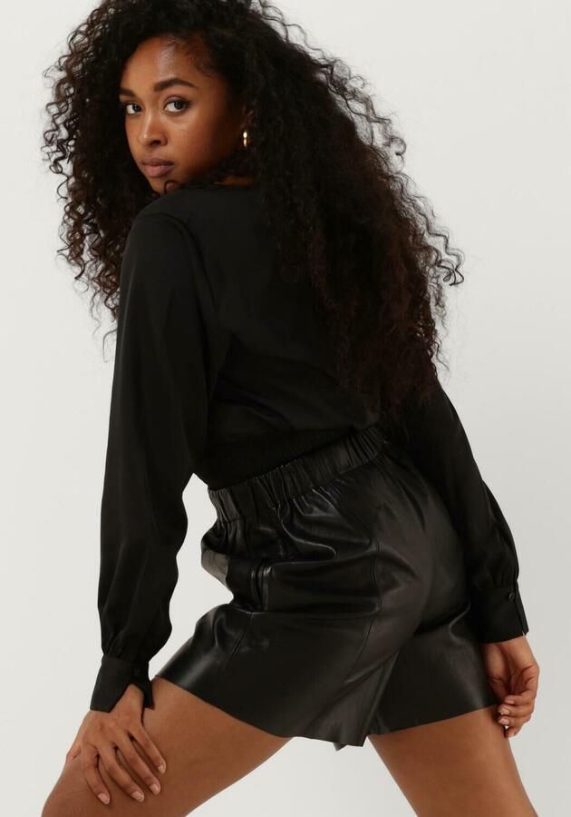 ANOTHER LABEL Dames Tops & T-shirts Linnea Shiny Top L s Zwart