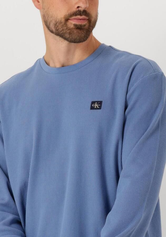CALVIN KLEIN Heren Truien & Vesten Ls Waffle Badge Crewnk Tee Lichtblauw - Foto 2